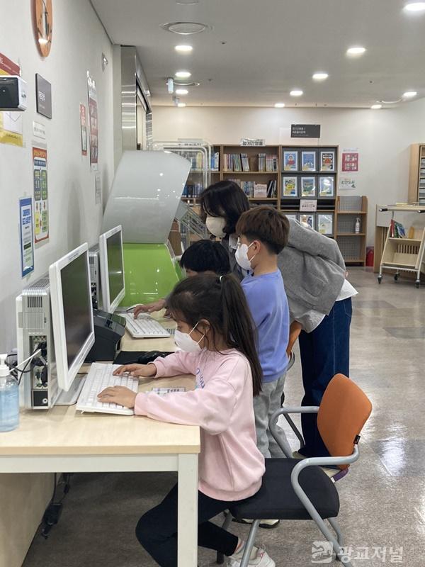 5. 상현도서관이 취약계층 아동을 대상으로 책 읽기 프로그램을 운영한다.jpg